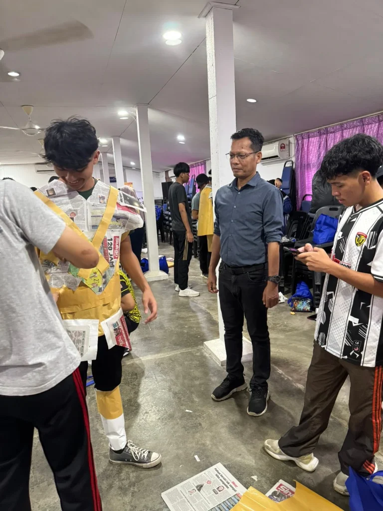 Participants completing a creative activity during an AI workshop