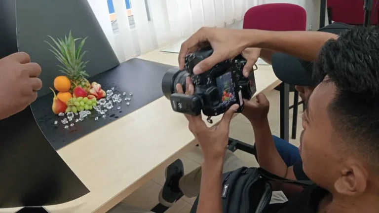 Camera and product setup during a practical photography workshop