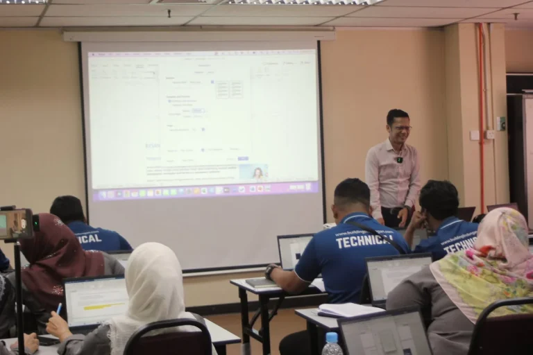 Participants learning computer skills in a Microsoft Office workshop